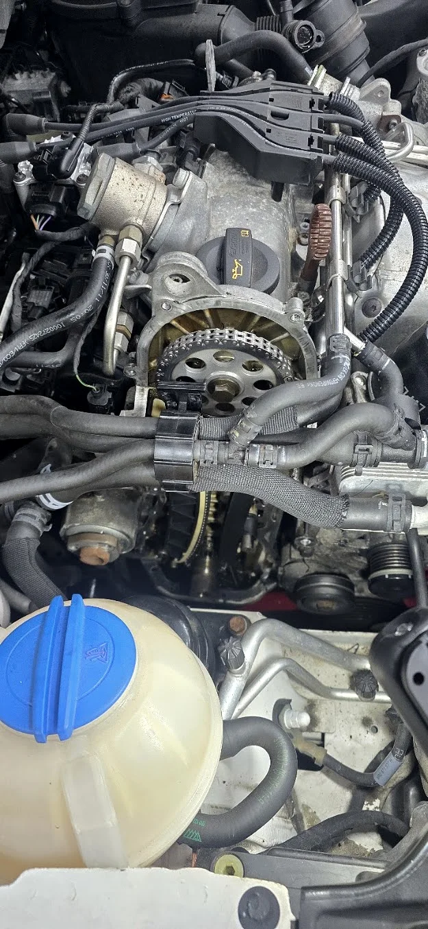 Timing components exposed for inspection inside the AB Auto Services workshop